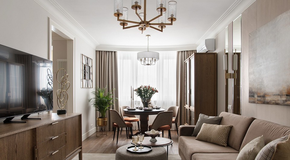 Dining area with brass chandelier
