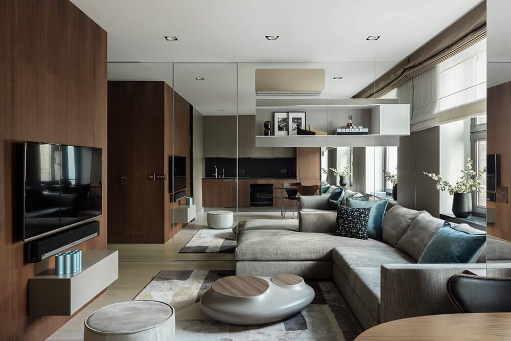 Mirrored living room with grey sectional sofa, Patriarshie